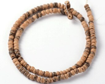 Natural coconut beads. 4mm. Washers. Rosary of 100.