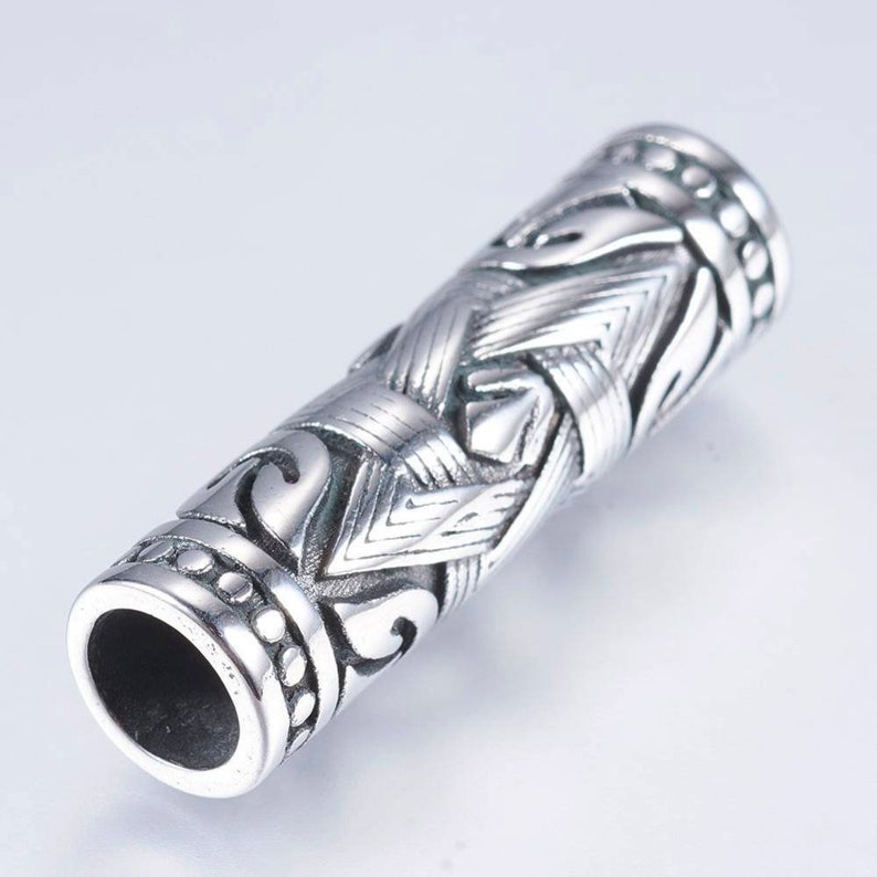 Perles tube style tibétain en acier inoxydable 304. Vendu à l'unité. image 1