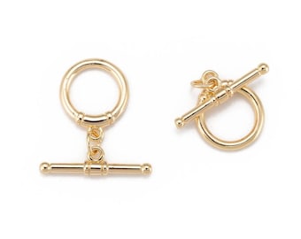 18k gold plated T clasps, with jump rings, 17x14x2.5 mm. Sold individually.