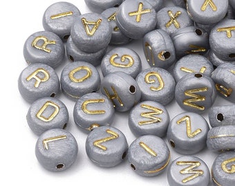 Gray and gold acrylic letter beads. 7mm. Sold individually or in packs of 5.