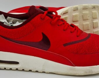white nike thea trainers