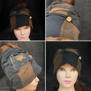 May include: A patchwork hat in black, brown, and grey fabric. The hat features a button detail on the side and is designed to accommodate a ponytail. The hat is displayed on a mannequin head.