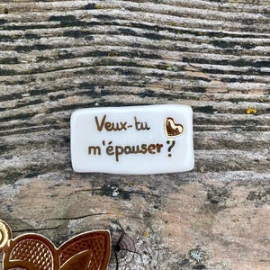 Fève au coeur d’or demande en mariage « veux-tu m’épouser ?»