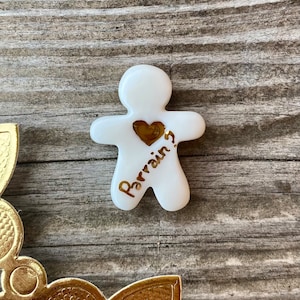 Fève Manele with a heart of gold asks “godfather?”