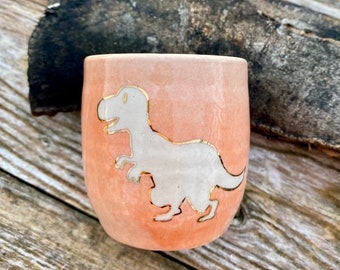 Dinos'or orange sandstone cup decorated with gold - tyrannosaurus dinosaur