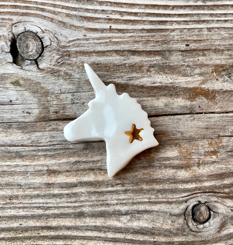 Gold star porcelain unicorn bean image 1