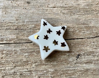 Fève in porcelain stars gilded with gold