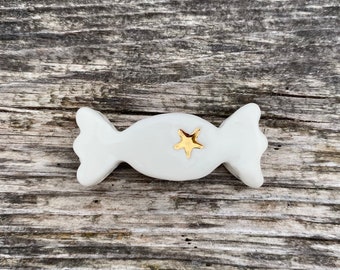 Gold star porcelain candy bean