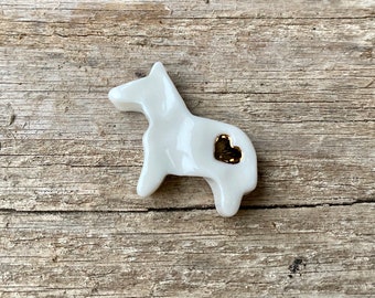 Porcelain horse bean with a heart of gold