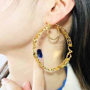 Gold hoops with words hotsell