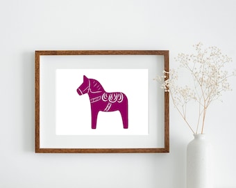May include: A framed print of a pink Scandinavian Dala horse silhouette on a white background.