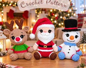 May include: Three crocheted dolls featuring a reindeer with brown antlers and a green sweater, a Santa Claus in a red suit with a white beard, and a snowman wearing a black top hat and a blue scarf, with the text Crochet Pattern above.