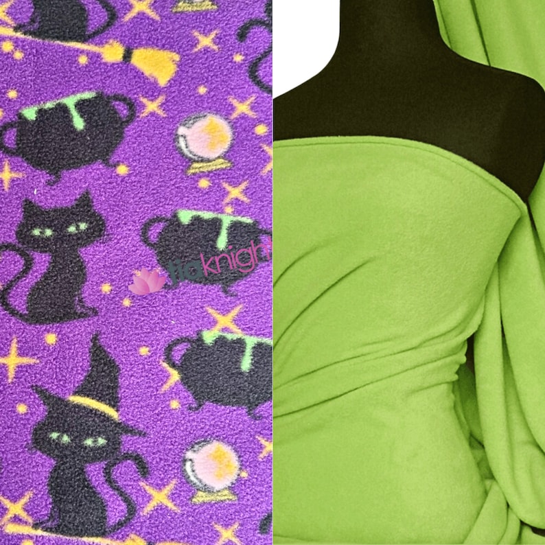 May include: Purple fleece fabric with a black cat, cauldron, and crystal ball Halloween print. A solid green fleece fabric is shown next to the printed fabric.