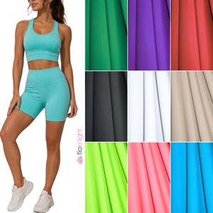 May include: A turquoise athletic set consisting of a racerback sports bra and high-waisted shorts. The image includes a color palette grid showing fabric swatches in green, purple, red, black, white, beige, lime, pink, and bright blue.
