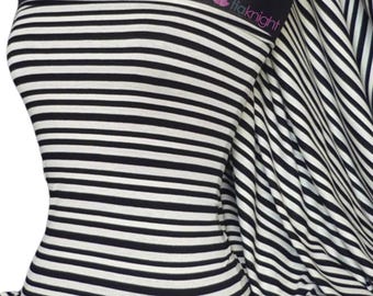 May include: Black and white striped fabric with a white label that says "tiaknight".