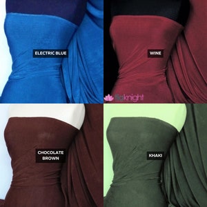 May include: Four fabric swatches in different colors: electric blue, wine, chocolate brown, and khaki. The fabric is a stretchy, silky material.