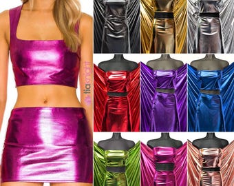 May include: A two-piece set consisting of a sleeveless crop top with a square neckline and a matching mini skirt. The garment is made of a shiny, metallic fabric available in various colours including magenta, gold, silver, red, purple, blue, and green.
