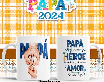May include: Two white ceramic mugs with blue and white illustrations. One mug features a father and child's hands clasped together with the text "Papá" and "Lucia". The other mug features the text "Papá el primer HÉROE de un hijo y el primer AMOR de una hija".