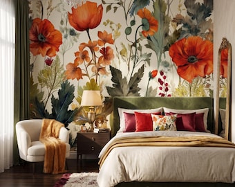 Può includere: Una camera da letto con un grande murale di carta da parati floreale con vivaci papaveri arancioni e fogliame verde. La stanza include un letto imbottito verde con cuscini rossi e fantasia, una poltrona bianca con un plaid dorato e un comodino.