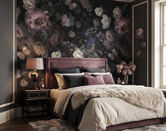 May include: A bedroom featuring a dark floral wallpaper with roses and butterflies, a mauve velvet upholstered bed with cream bedding and a faux fur throw, a black nightstand with a lamp, and a gray shag rug on a dark wood floor.