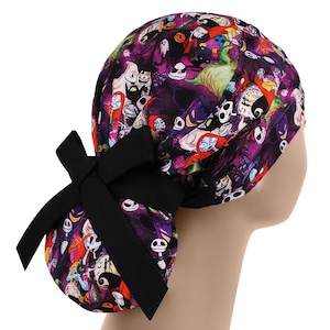 May include: A scrub cap featuring a vibrant, multi-colored print of various characters from The Nightmare Before Christmas against a dark purple background. The cap includes a solid black fabric band and a black ribbon tied into a bow at the back.