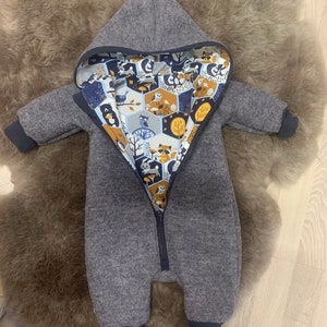 Walk suit, walk overall, medium gray cuffs in dark blue forest animals with zip and hood