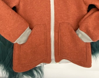 Bolsillos adicionales. Sólo en combinación con la compra de una chaqueta o un mono de lana.