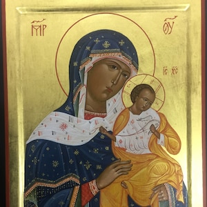 The Virgin with little Jesus in her arms holding pigeons. orthodox icon,  Konevskaya Golubitskaya icon of the Mother of God,