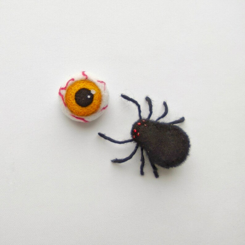 Set of 2 halloween brooches Felted creepy cute pins. Spider brooch and halloween evil eye brooch