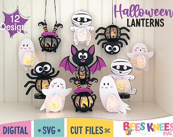 May include: Twelve Halloween lantern designs, including a ghost, spider, bat, mummy, and witch's cauldron. The lanterns are white, black, and purple with intricate cut-out designs.  The text "Halloween Lanterns" is at the top of the image.  The text "12 Designs" is in a purple starburst shape at the top left of the image.  The text "Bees Knees SVG" is at the bottom right of the image.