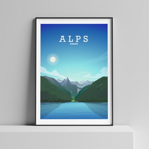 May include: A framed poster with a minimalist illustration of the Alps in Europe. The poster features a mountain range with a lake in the foreground and a bright blue sky with a white sun.