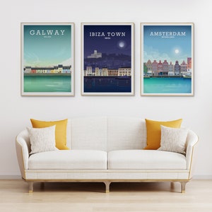 May include: Three framed city skyline prints, each with a different city name and country. The first print is of Galway, Ireland, the second is of Ibiza Town, Ibiza, and the third is of Amsterdam, Netherlands.