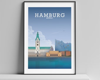 Op de afbeelding: Een ingelijste illustratie van de skyline van Hamburg, met de Elbphilharmonie concertzaal en het historische stadhuis. De tekst "HAMBURG GERMANY" staat bovenaan de afbeelding.