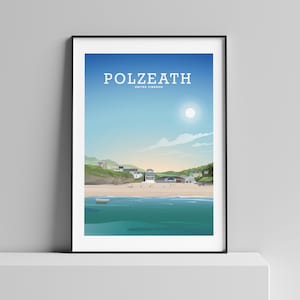 May include: A framed art print featuring a coastal scene of Polzeath, United Kingdom. The artwork depicts a beach with turquoise water, a sandy shore, and buildings along the coast under a blue sky with a bright sun. The word "POLZEATH" is at the top.