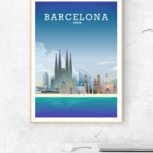 May include: A colorful illustration of the Barcelona skyline, featuring the Sagrada Familia, the W Hotel, and other iconic landmarks. The city is depicted against a blue sky with white clouds, and the sea is shown in the foreground. The text "BARCELONA SPAIN" is displayed at the top of the image.
