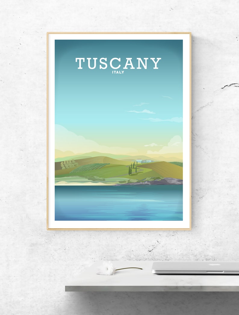 May include: A vintage travel poster with a blue sky and white clouds. The poster features a landscape with rolling green hills, a body of water, and the text "Tuscany, Italy".
