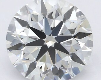 May include: A round, clear diamond with a brilliant cut. The diamond has many facets that reflect light.