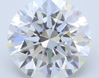 May include: A round, clear diamond with a brilliant cut. The diamond has many facets that reflect light.
