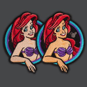 May include: Two embroidered patches of Ariel from The Little Mermaid. Each patch features Ariel with her signature red hair, purple seashell bra, and a blue and purple background. One patch has a small Mickey Mouse silhouette in the background.