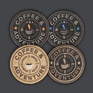 May include: Four embroidered patches with a compass design and the text "Coffee & Adventure". The patches are in two color variations: black with orange and blue accents, and tan with brown accents.