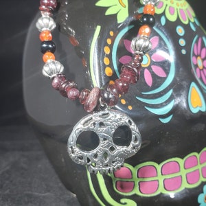 Halloween Sugar Skull Choker Necklace with Natural Garnet Chips, Natural Orange Jade, and Natural Onyx. Garnet and Jade Halloween Skull