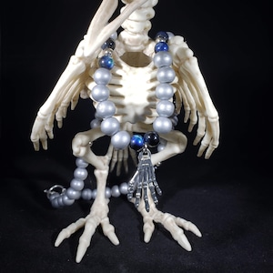 Wood and Glass Beaded Skeleton Hand Necklace / Gothic Skeleton Hand Necklace / Halloween Jewelry / Wood Bead Jewelry / Silver and Black