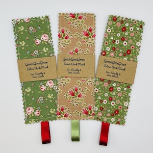 May include: Three fabric bookmarks with floral patterns and a brown label that reads "Gracie Goes Green Fabric Book Mark Eco-Friendly & Zero Waste".