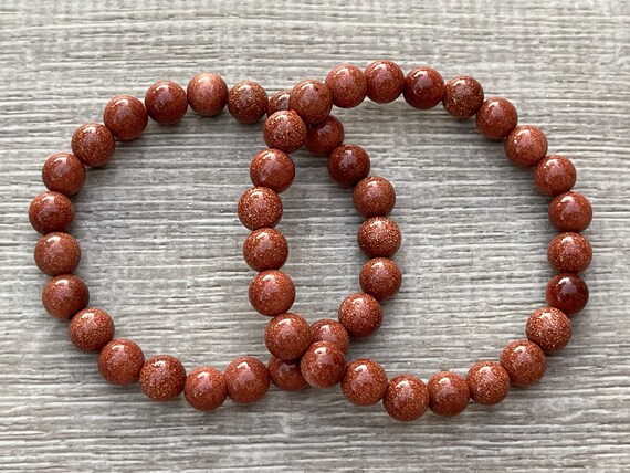 Red goldstone best sale bracelet