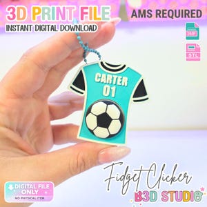 May include: A 3D printed fidget clicker in the shape of a turquoise and black football jersey with the name CARTER and the number 01 printed on the front. A black and white football graphic is centred below the text. Includes a blue ball chain.