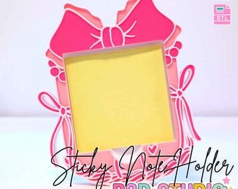 May include: A pink and white 3D-printed sticky note holder in a bow shape, with a yellow sticky note pad inside. The text "3D PRINT FILE" and "INSTANT DIGITAL DOWNLOAD" are at the top. The words "Sticky Note Holder" and "B3D STUDIO" are also visible.