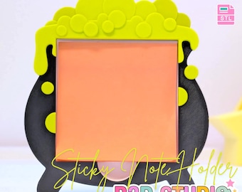 May include: A black 3D printed sticky note holder shaped like a cauldron with bright lime green bubbles overflowing at the top. The center features a square orange sticky note pad. Text on the image includes 3D PRINT FILE, 3MF, STL, Sticky Note Holder, and B3D STUDIO.