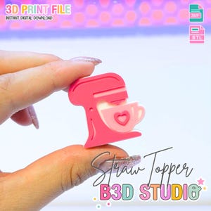May include: A pink and white 3D-printed straw topper in the shape of a kitchen mixer, with a heart-shaped design on the bowl. The text "Straw Topper" and "B3D STUDIO" are also visible.