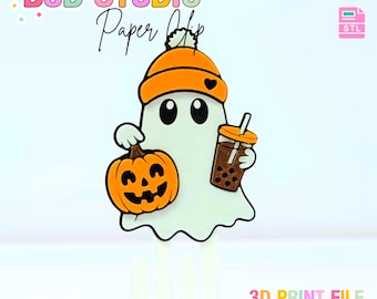 May include: A cartoon ghost wearing an orange beanie and holding a jack-o'-lantern and a bubble tea. The image has the text "B3D STUDIO Paper Clip" and "3D PRINT FILE INSTANT DIGITAL DOWNLOAD".