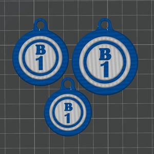 May include: Three blue and white circular pendants with a loop at the top for hanging. Each pendant has a white center with the letters "B" and the number "1" in blue. The pendants are different sizes.